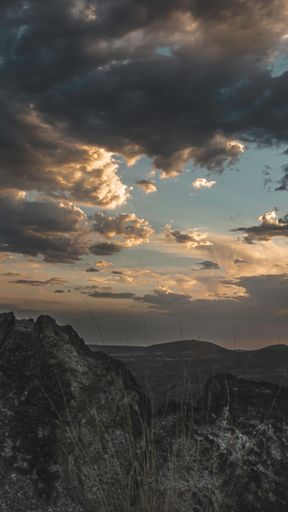 A vertical shot of a cloudy sunset over El Paso, Texas