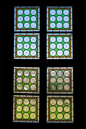 A vertical shot of a window in Corvin castle