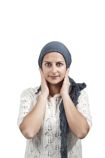 A vertical shot of a middle eastern woman with her bandana on her head isolated on white background