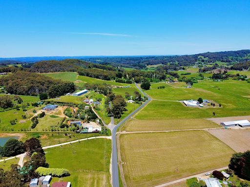 An aerial view of a rural landscape on a sunny day