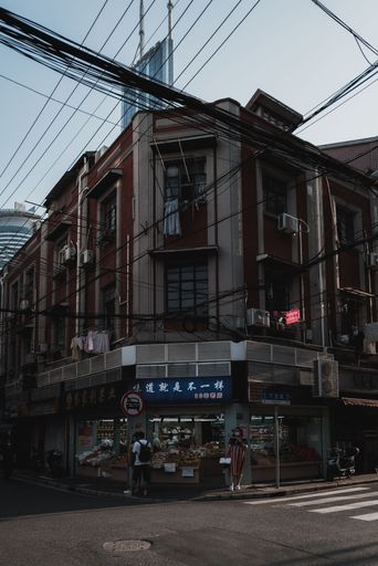 A vertical shot of a classic old Shanghai neighborhood building