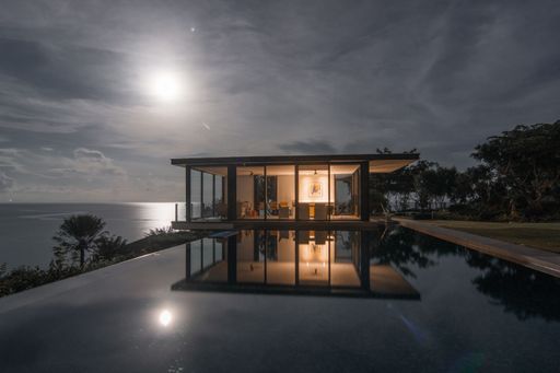 A pool house by the sea in Tabogon under the moon light during the night.