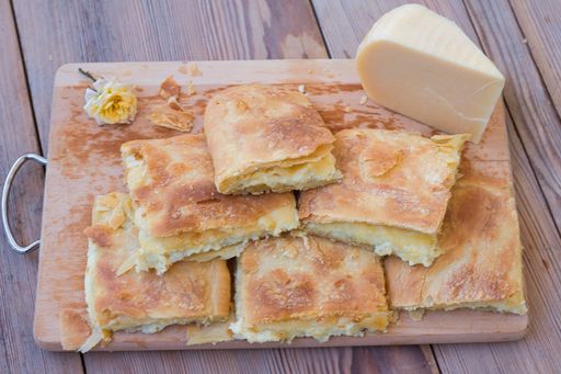 authentic village cheese pie made with handmade village foil and Kaseri cheese, Village, crispy and delicious pie