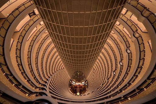 The interior of Jin Mao Tower looking down to the lobby of the Grand Hyatt Hotel, Shanghai, China