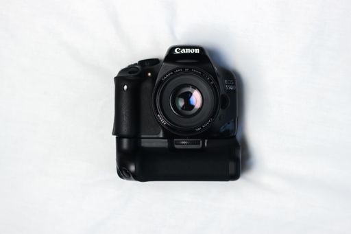 A high angle isolated shot of a Canon camera on white background