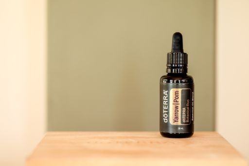Illustrative editorial image of doterra essential oils on white background