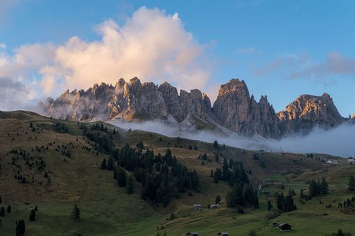 The cloudy blue sky over Dolomites, Alps, Groeden, Sella Pass, South Tyrol, Italy