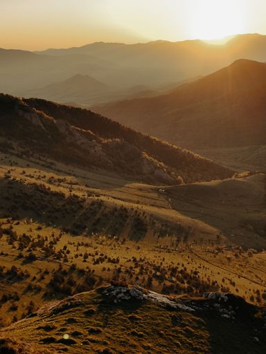 a beautiful sunshine over scenic valley and hills