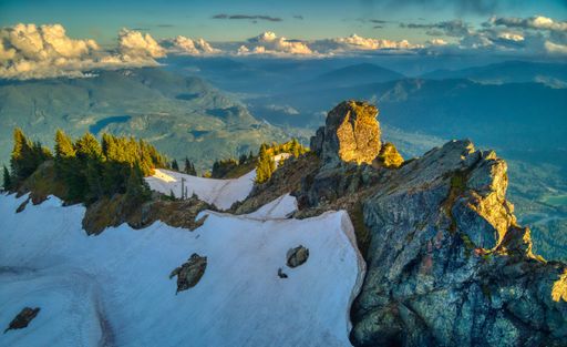 An aerial view of the snowy rocky Sauk mountain in Washington