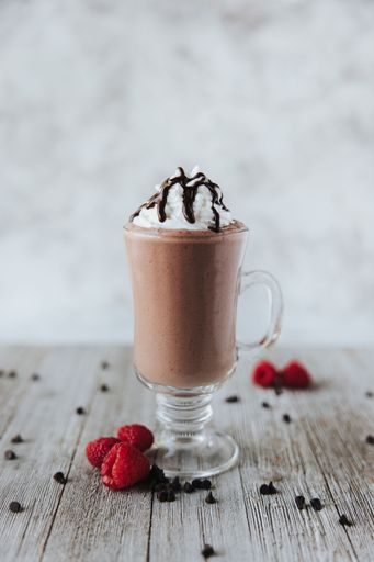 A vertical shot of the Chocolate Milkshake with Raspberry