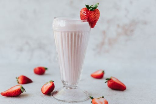 A closeup shot of a strawberry milkshake