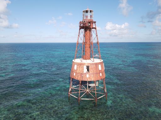 A scenic shot of the Sombrero Key Light on a sunny day in Marathon, Florida, US