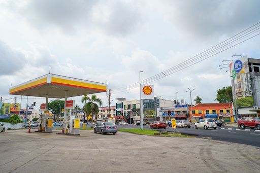 Melaka, Malaysia - Aug 25, 2022 Shell petrol pump station in a busy town.