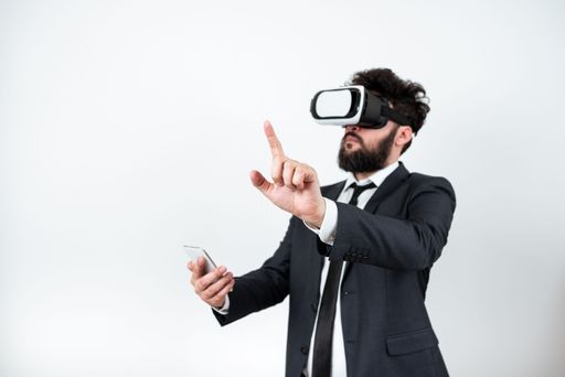 Man Wearing Vr Glasses And Pointing On Messages With One Finger. Businessman Having Virtual Reality Eyeglasses And Showing Crutial Information.