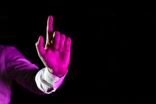Hand Of Male Professional Pointing And Gesturing While Training Through Virtual Reality Simulator. Man Finger Presenting Futuristic Technology.