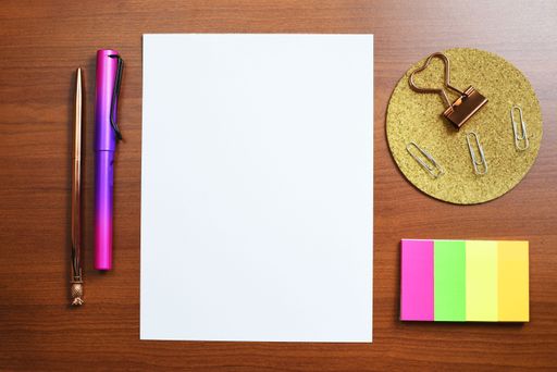 Piece Of Paper With Information On Desk With Pencils, Notes And Paperclips. Crutial Announcements Presented On Notepad On Table With Office Supplies.