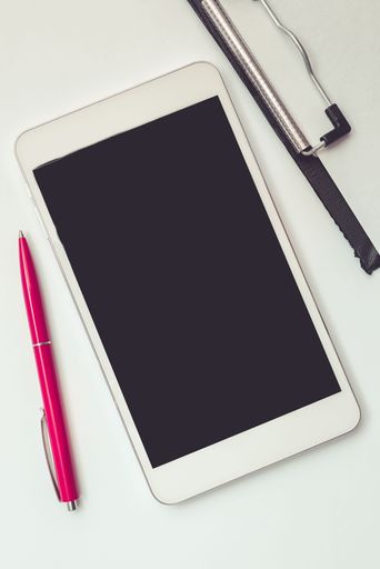 Mobile Phone With Message On Desk With Empty Notebook And Notes. Cellphone Screen With Crutial Information On Table With Notepad And Memos.