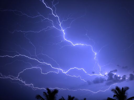 A Lightning thunderstorm flash over the night sky