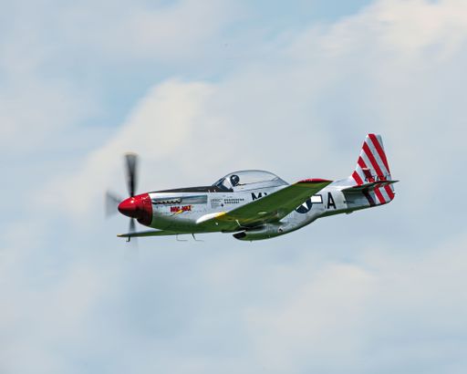 A low angle shot of North American P-51 Mustang during the airshow