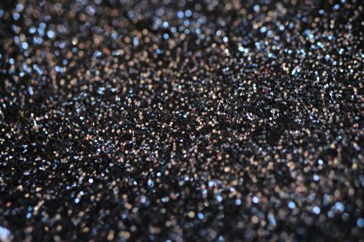 A closeup shot of the silver glitter as a background