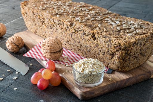 Aut Bread, fresh baked on dark vintage wooden table