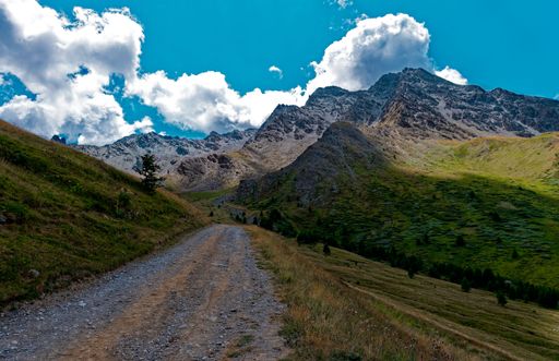 A beautiful shot of a pathway with mountainous landscape