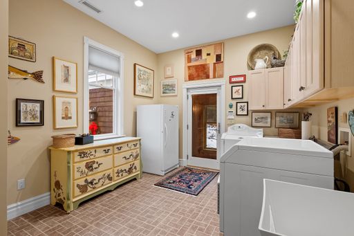 An interior of spacious laundry room