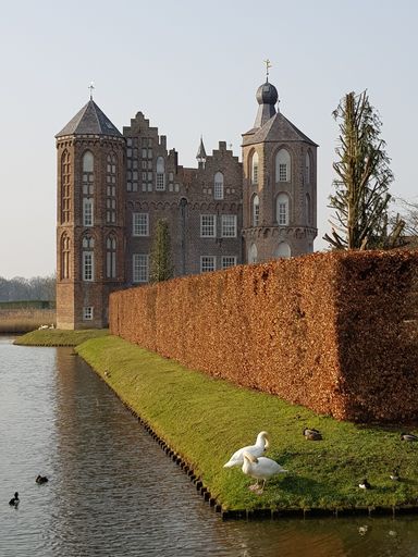 A Croy castle in Netherlands with two white birds