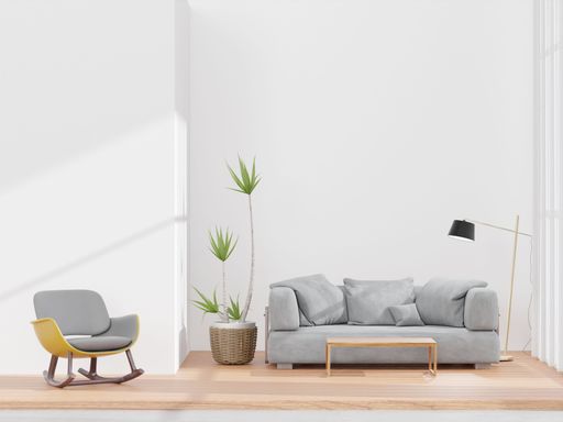 A 3D rendering of a living room with a white wall gray sofa