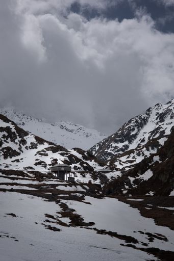 A vertical shot of the snowy mountains in Switzerland