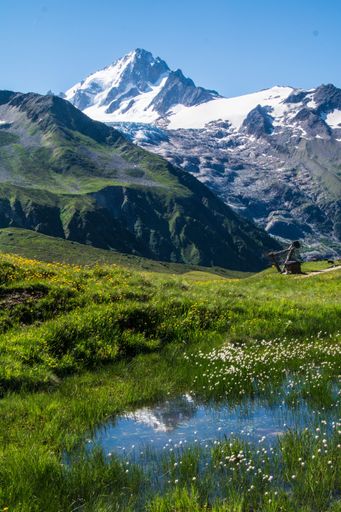 A landscape scene of green hills and lake in charamillon gondola alps in Haute Savoie, France