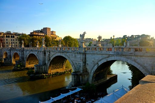 The beautiful ancient St. Angelo Bridge captured on a sunny day in Rome, Italy