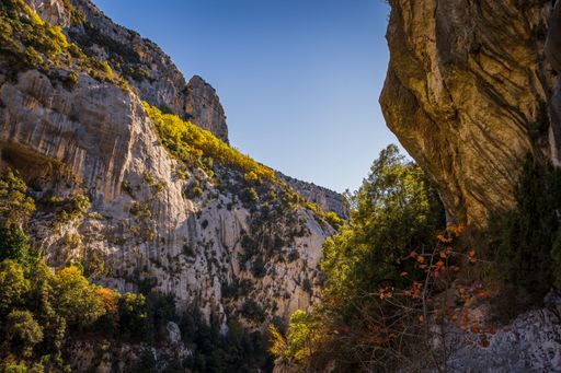 The rugged mountains with green vegetation in the Blanc-Martel trail in La Palud-sur-Verdon, France
