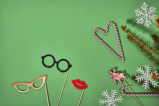 A Christmas decoration on a green background