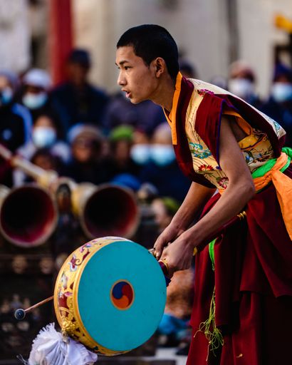 A vertical shot of the Tibetan Buddhist musician at the Tiji Festival in Lo Manthang, Nepal