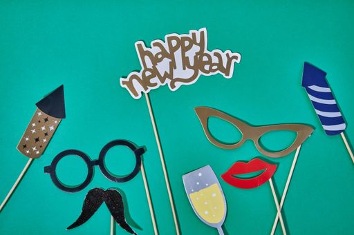 A "happy new year" decoration on a green background