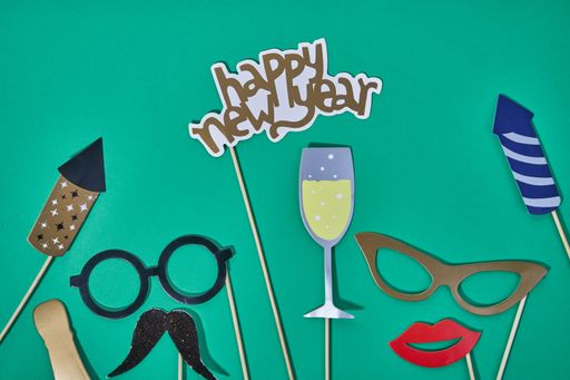 A "happy new year" decoration on a green background
