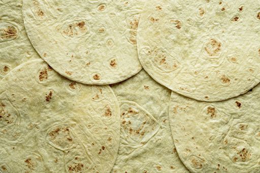 A closeup shot of tortilla bread on top of each other