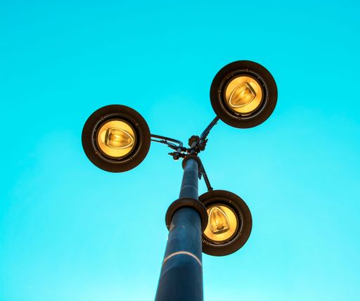 A low angle view of street lamps