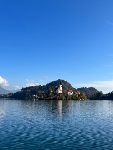A vertical shot of Lake Bled in the Julian Alps of the Upper Carniolan region of northwestern Slovenia
