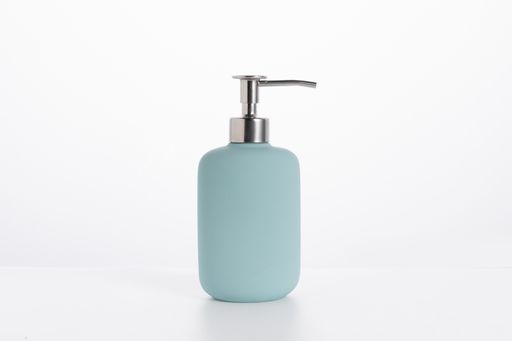 A blue glass soap bottle isolated on a white background