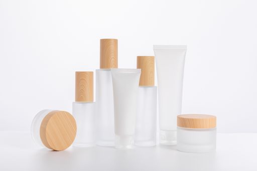 A set of skincare bottles and containers isolated on a white background