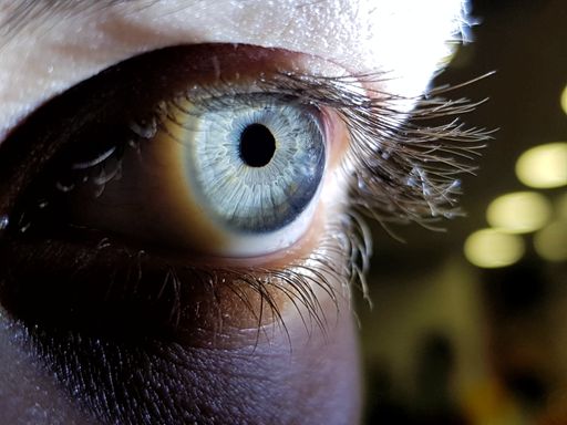 A beautiful macro closeup shot of a female human's deep eyes