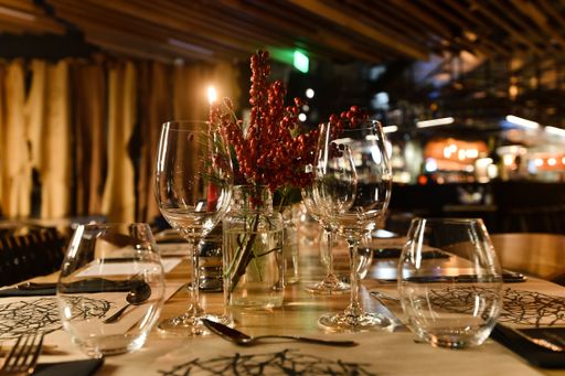 A beautiful decorated Xmas table with a red candle