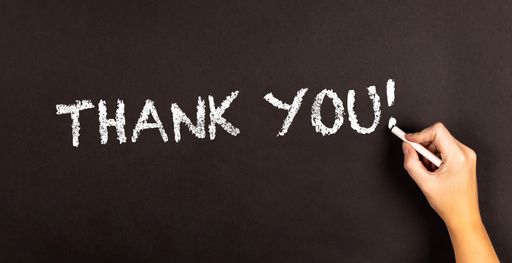 The words " Thank You!" written on a blackboard