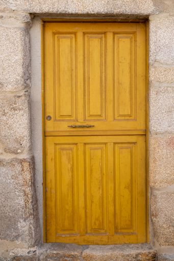 old door in a medieval house in the village of Allariz, Galicia. Spain.