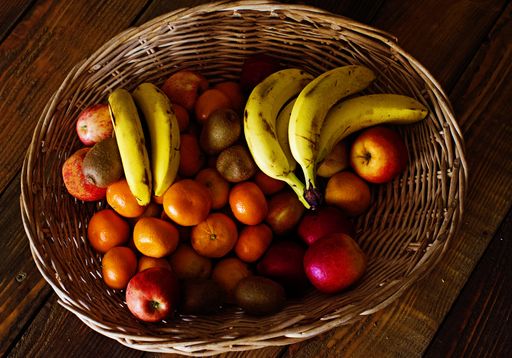 A top view of the various delicious fruits in the basket