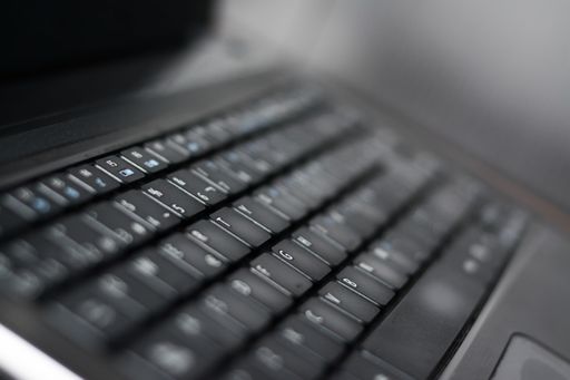 A closeup of black laptop keyboard