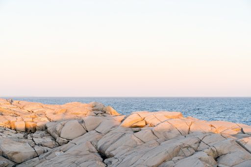 A beautiful view of Peggy's Cove in Nova Scotia, Canada during sunset