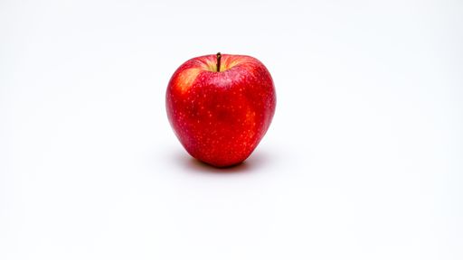 An isolated shot of a ripe red apple